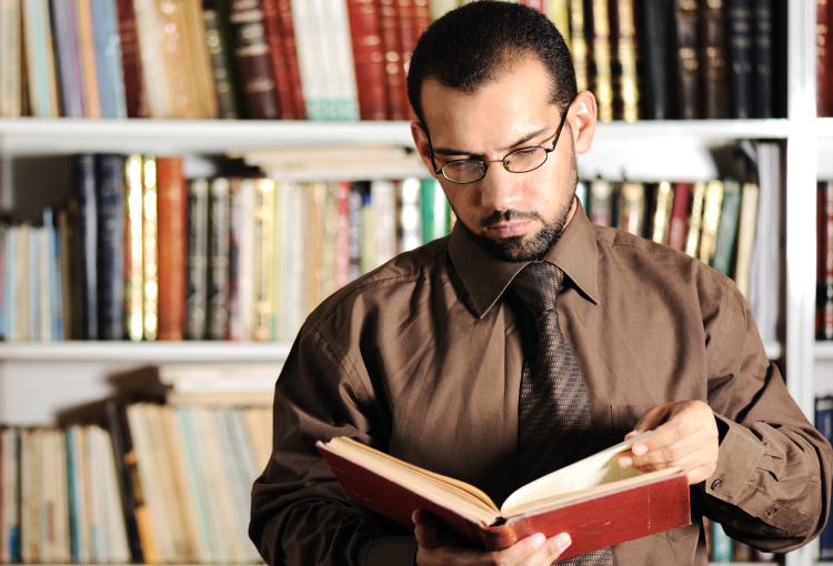 man studying in library